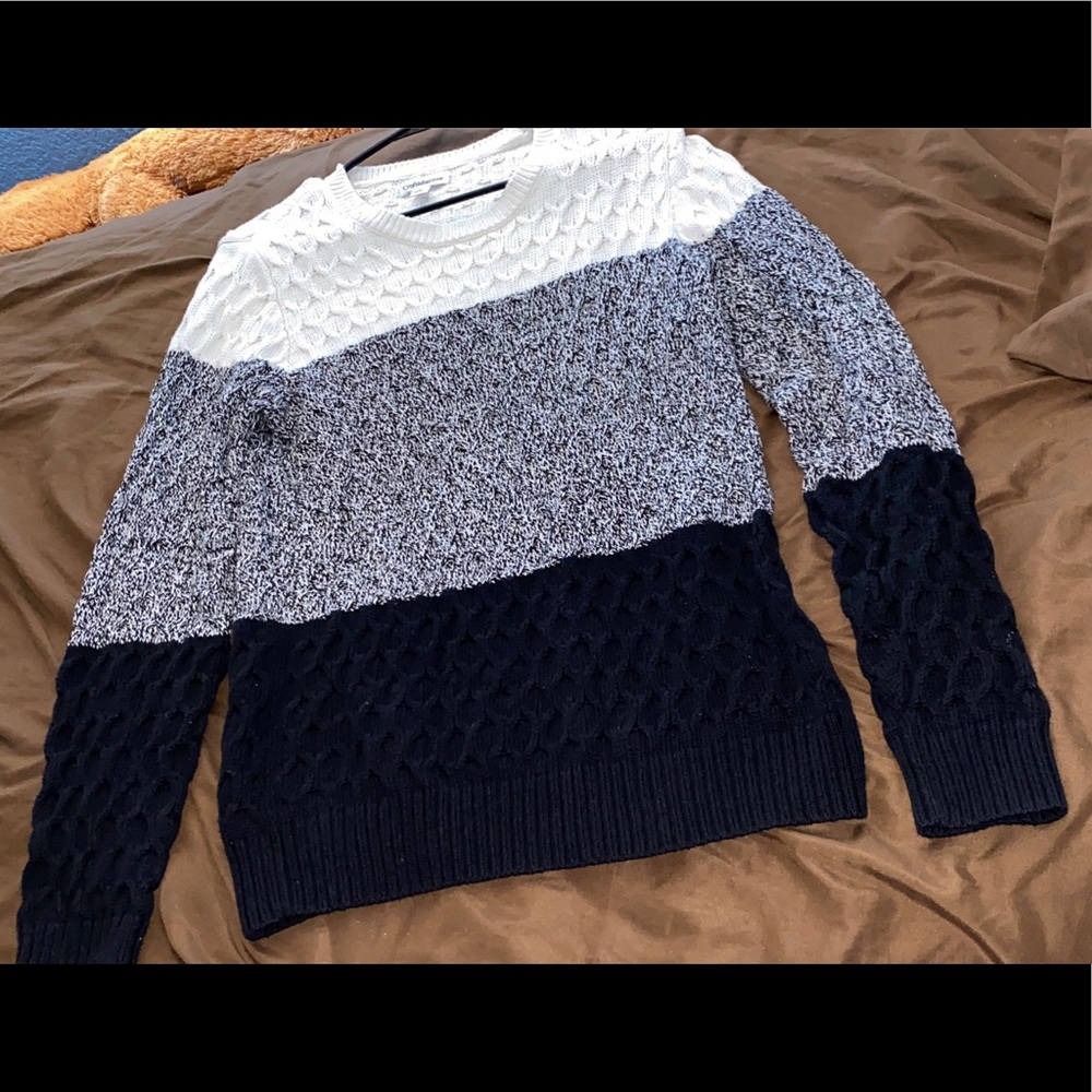 Knitted black, grey, and white, sweatshirt.